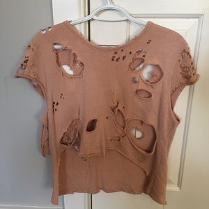 Light salmon color distressed top with holes